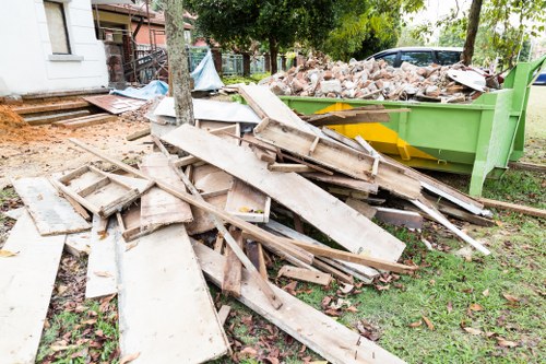 Front view of a house in Pinner with belongings organized for clearance