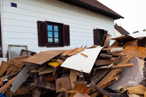 Employees managing waste in a Pinner office environment