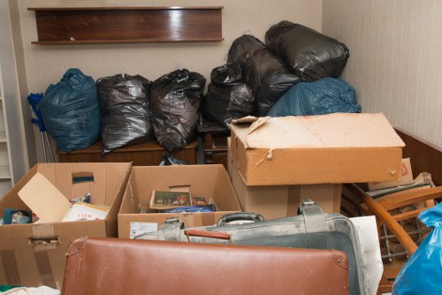 Different types of business waste being sorted for removal in Pinner